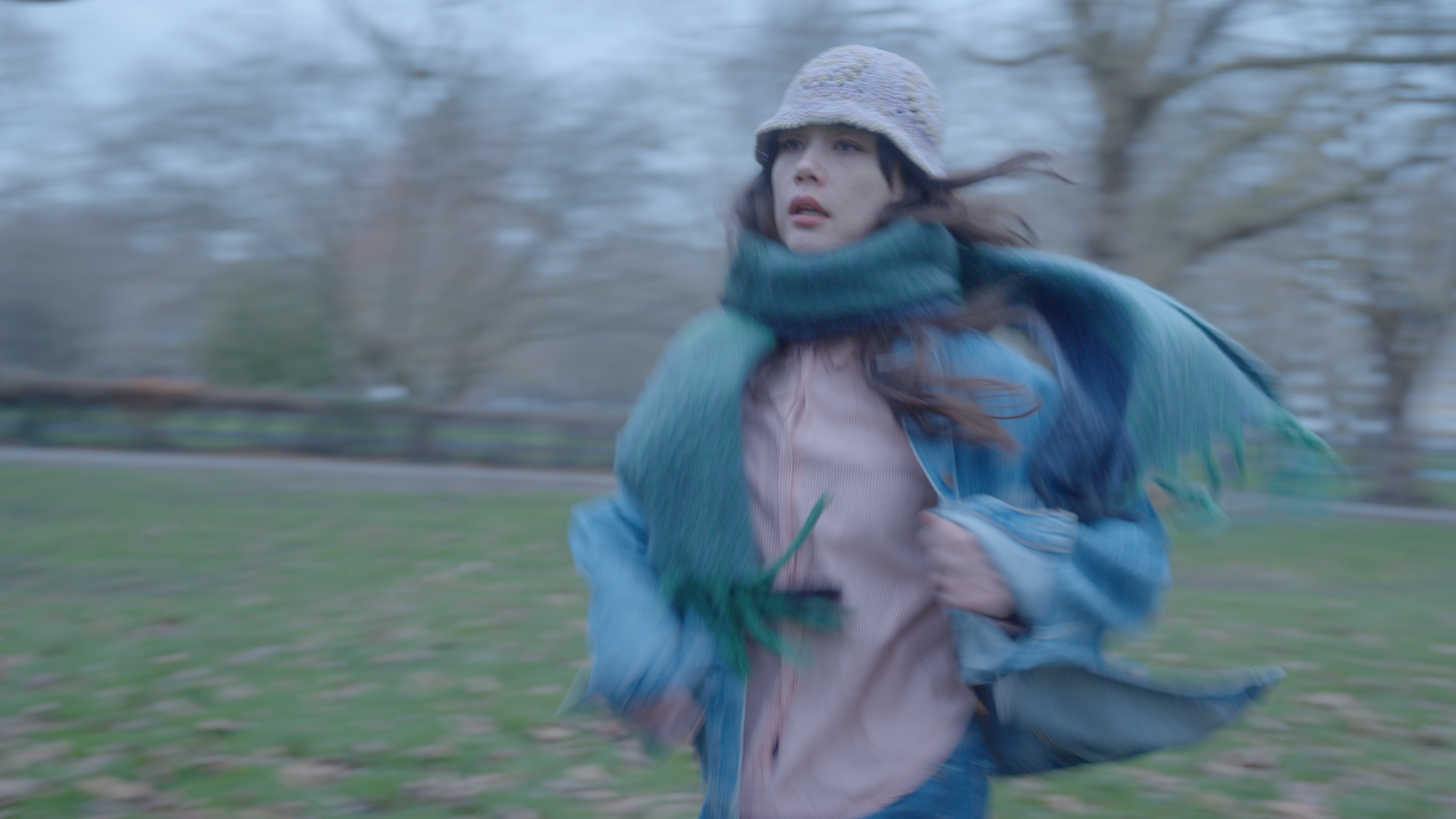 A woman running in a field