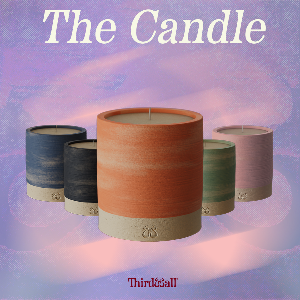 The Candle product picture displaying the range of colours. 1x Mint, 1x Blue, 1x Coral & 1x Charcoal and 1x exclusive Pink version